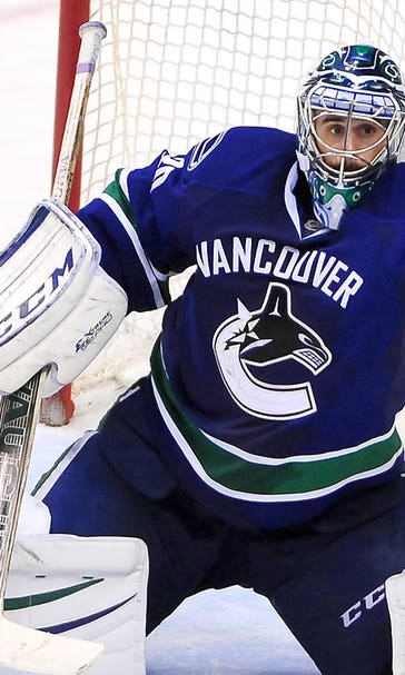 Canucks' Ryan Miller posts 300th career win, keeps Hurricanes winless